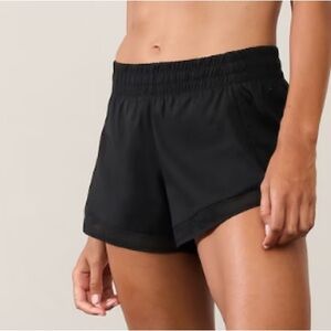 Athleta Racer Run 4” black shorts - size XS